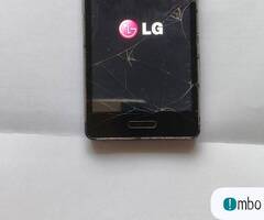 Sprzedam uszkodzony telefon LG E460 plus bateria. - 1